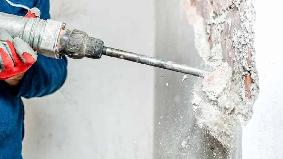 Demolition and debris removal workers on job site